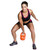 Model swinging the Tone Fitness PVC Coated Cement Kettlebell