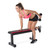 model using dumbbells on CAP Strength Memory Foam Flat Bench