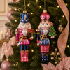 Raz 8.25" Set of 2 Bright Nutcracker Glass Christmas Ornament 4652874-2