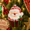 Raz Eric Cortina 4.25" Kris Kringle Cupcake Glass Christmas Ornament 4653180-2