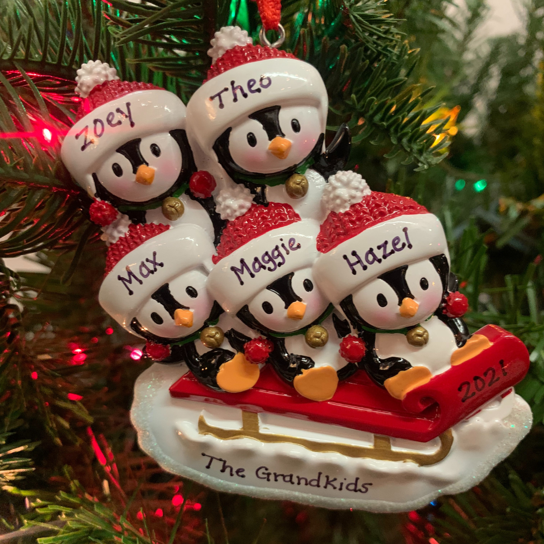 Family of Penguins on Sled Personalized Christmas Ornament