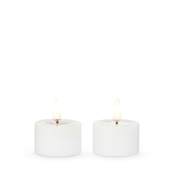 Raz 1.75" White Battery Operated Tealight Candles with Melted Tops and Realistic Flame 4559440 -2 Raz 1.75" White Battery Operated Tealight Candles with Melted Tops and Realistic Flame 4559440 -2