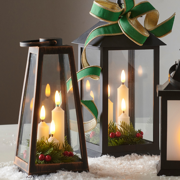 Raz 9.25" or 12" Battery Operated Lantern with Realistic Flame Candles and Greenery Raz 9.25" or 12" Battery Operated Lantern with Realistic Flame Candles and Greenery