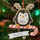 pretendente de pinguim de 4,25" usando chifres de enfeite de natal personalizado ou2185 