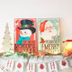 Raz Set of 2 28" Vintage Christmas Snowman and Santa Wood Wall Art Signs 4328035