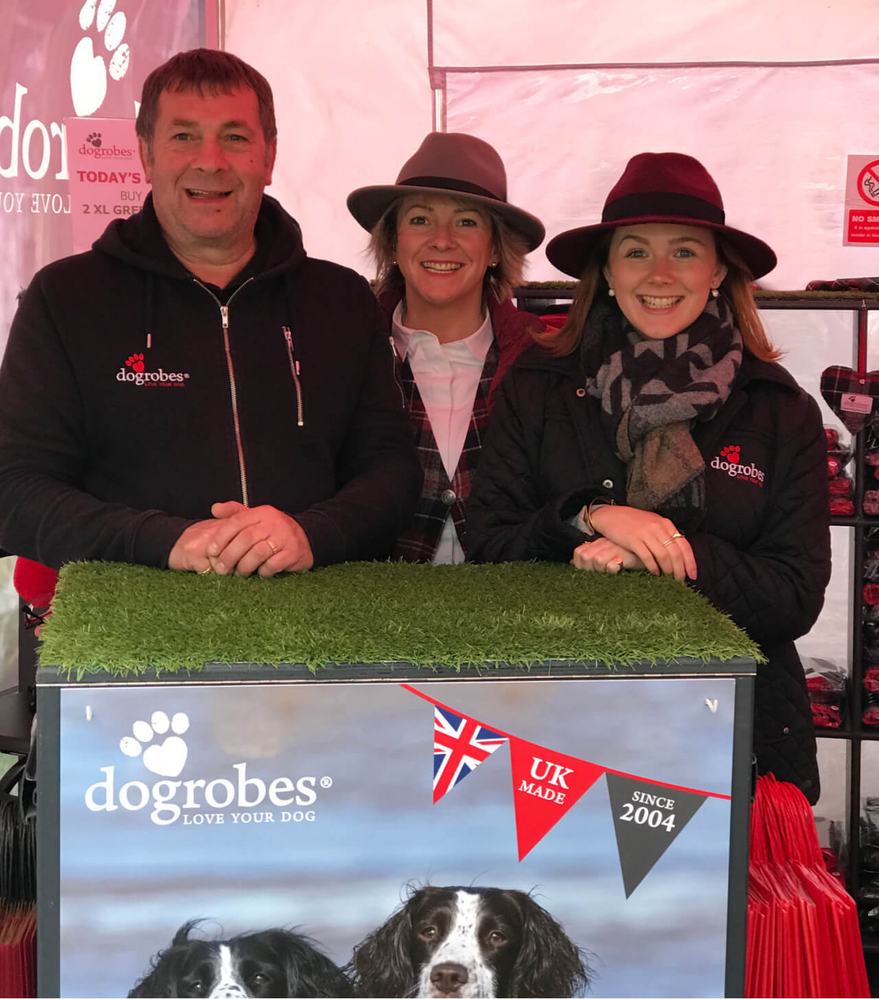 Dogrobes family team at event promoting UK made dog drying coats