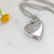 The Claire with Paws Cremation Necklace in Sterling Silver / Silver - product view 2
