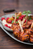 Raspberry Chipotle Chicken Lollipops