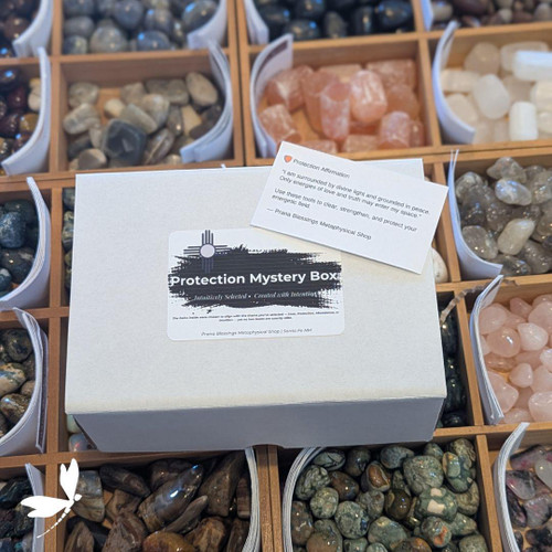 Protection Mystery Box with black brushstroke label and Zia sun symbol, intuitively curated for grounding, cleansing, and energetic protection. Protection Mystery Box with black brushstroke label and Zia sun symbol, intuitively curated for grounding, cleansing, and energetic protection.