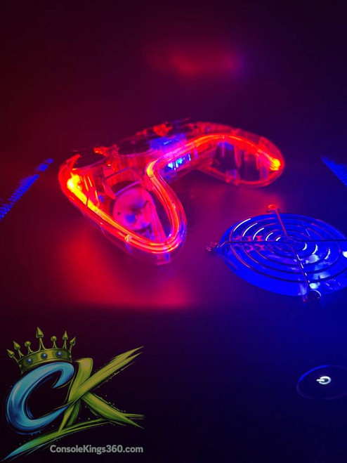 Modded Xbox 360 Phat RGH3 with custom LED colors and upgraded 2TB storage for ultimate gaming performance. ConsoleKings360.com