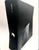 Xbox 360 Slim RGH3 in black with custom green LED upgrades. Available from ConsoleKings360.com.