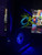 Black Xbox 360 Phat RGH3 with custom Blue LED lighting and HoneyComb Grille. Professionally built by ConsoleKings360.com.