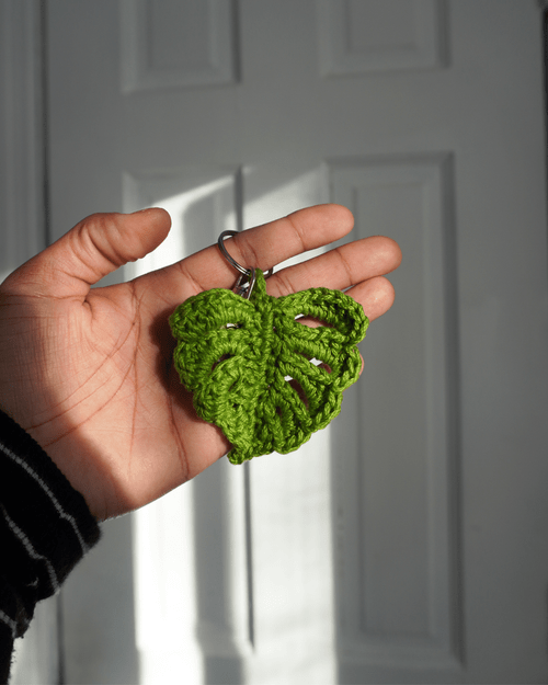 Front view of a handmade crochet Monstera Leaf in the Color green