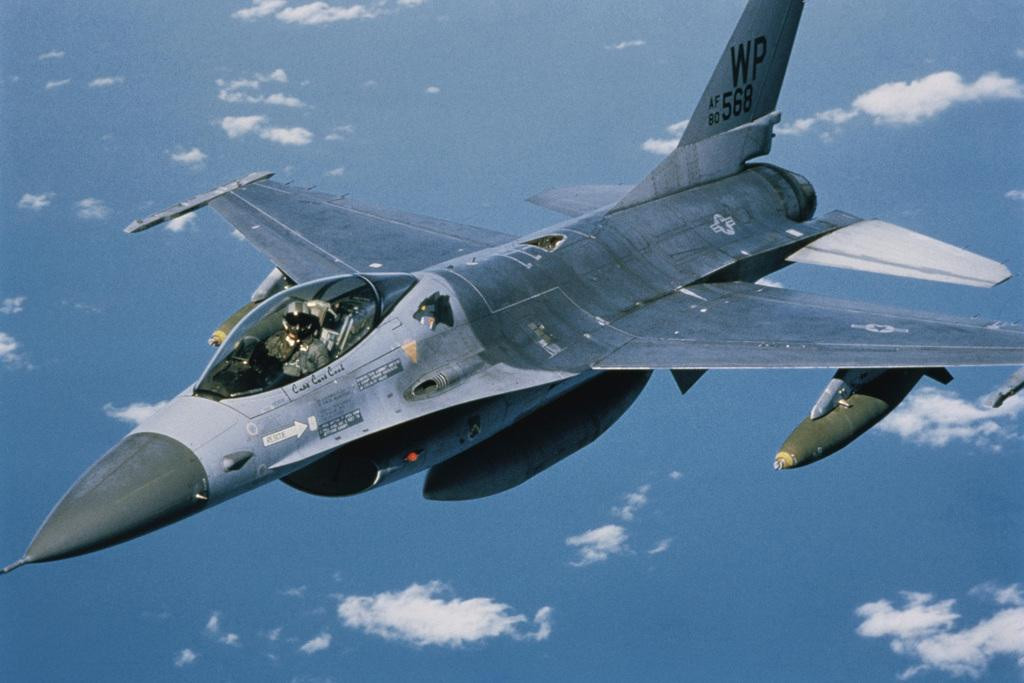 Aerial View of an F16 Fighting Falcon in Flight Photo Photograph