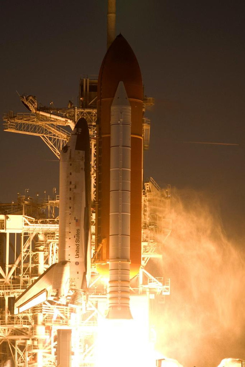 space shuttle blast off at night