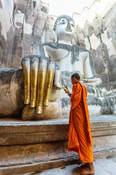 Laminated Monk Praying Near Giant Buddha Hand in Thailand Photo Photograph Poster Dry Erase Sign 16x24