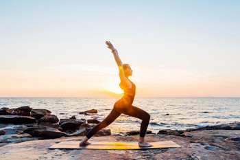 Laminated Young woman performs yoga moves on bluff above sea Poster Dry Erase Wall Art 24x36 Laminated Young woman performs yoga moves on bluff above sea Poster Dry Erase Wall Art 24x36