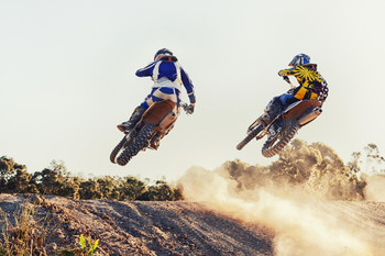 Laminated Taking It To The Sky Dirt Bike Riders During Jump Photo Art Print Poster Dry Erase Sign 36x24