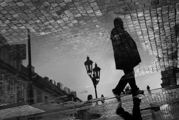 Laminated Reflection Man Walking Rainy Cobblestone Street Black White Photo Poster Dry Erase Wall Art 36x24