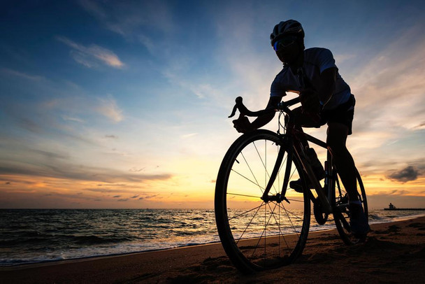 Laminated Cyclist Silhouette Biking On The Beach Sunrise Photo sunset pacific ocean wave surf sand cycling dawn sunset water tranquil exercising racing riding bicycle Poster Dry Erase Wall Art 36x24