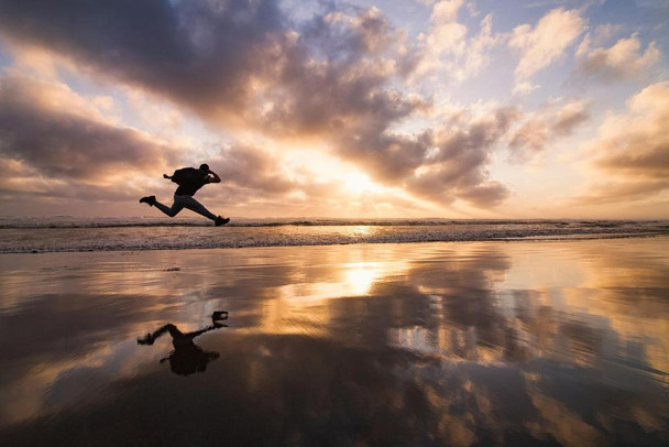 Laminated Man Jumping on Beach at Sunset Photo Photograph Poster Dry Erase Sign 36x24
