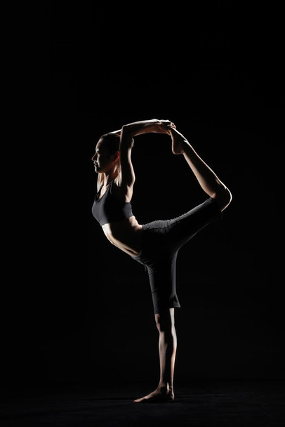 Laminated Woman to whom classic ballet strikes a pose Poster Dry Erase Wall Art 24x36