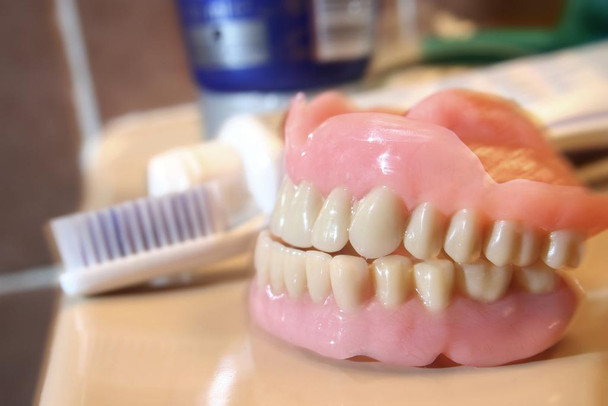 Laminated Artificial denture and toothbrush Poster Dry Erase Wall Art 24x36