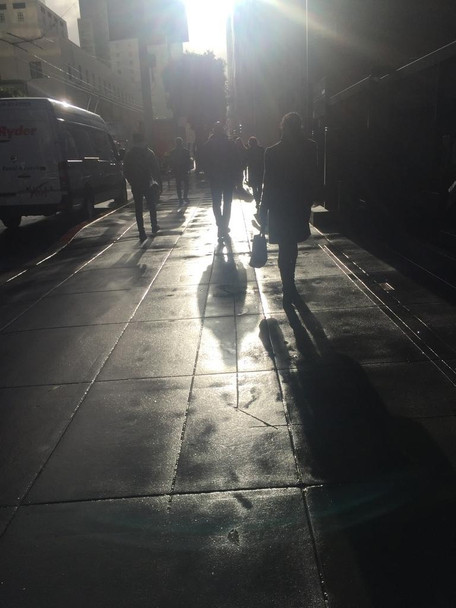 Laminated New York City People Walking Wet Sidewalk Sunburst Photo Poster Dry Erase Sign 12x18