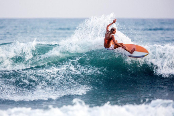 Laminated Female Surfer Surfing Waves in the Caribbean Sea Poster Dry Erase Wall Art 12x18