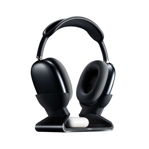 AirPods Max resting on charging stand while AirPods Pro charge on integrated wireless pad