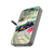 Flat lay composition showing the power bank next to an iPhone 15 Pro for scale
