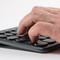 Close-up of UK layout with numeric keypad and ergonomic key design
