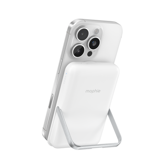 White Essentials snap+ Powerstation 10K on desk holding iPhone at perfect viewing angle for video calls