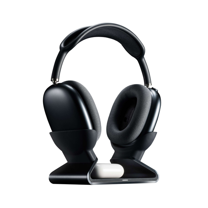 AirPods Max resting on charging stand while AirPods Pro charge on integrated wireless pad