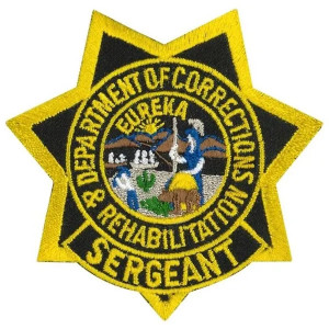 Close-up of CDCR Sergeant Star showing engraved detailing