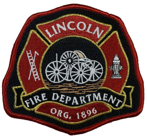 Close-up of embroidered Lincoln Police emblem and lettering
