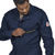 Close-up of Nomex taped brass break-away zipper on FR coverall