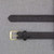 Close-up of 1.5" Off Duty Belt buckle showing solid gold metal hardware and reinforced stitching