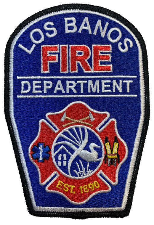 Close-up showing embroidered Los Banos Fire Department emblem Close-up showing embroidered Los Banos Fire Department emblem