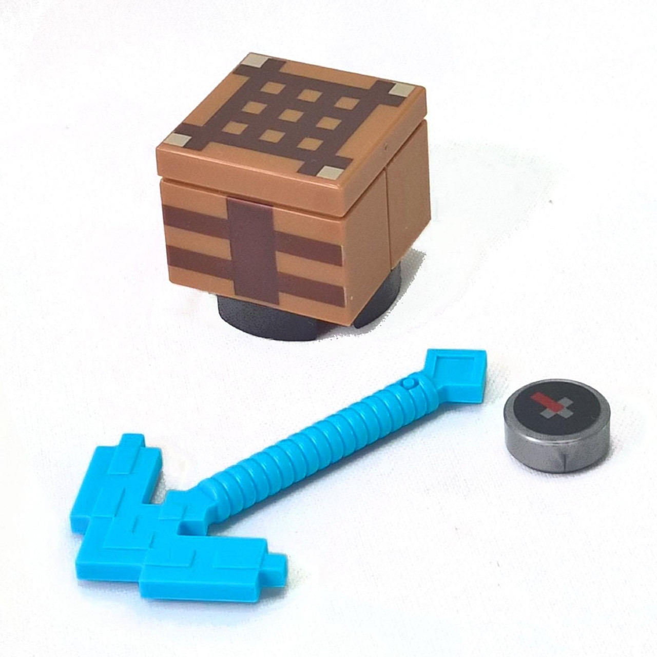 3 Minecraft Accessories pickaxe, table and compass - Online LEGO® Store. We pick bricks with care.