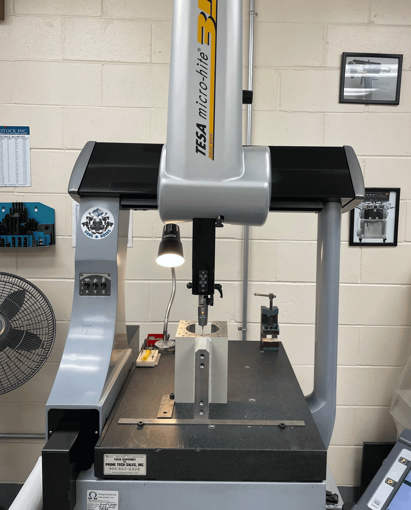 KOMO quality control equipment testing a part