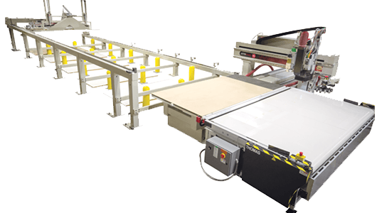 The automatic material handing system on the side of a KOMO cnc feed material onto the table.