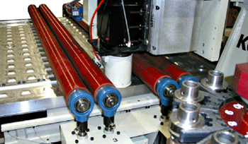 CNC router roller hold-down system