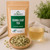 Organic Senna Leaf Tea in The Tea Hut certified organic kraft pouch, with loose senna leaves beside a pale golden brewed cup.