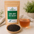 Bulk Earl Grey Tea (Decaf) in The Tea Hut certified organic kraft pouch, with loose decaf black tea and bergamot beside a rich amber brewed cup.