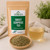 Organic Sweet Surprise Tea in The Tea Hut certified organic kraft pouch, with loose cacao, peppermint, liquorice root and fennel blend beside a warm amber brewed cup.