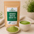Bulk Japanese Matcha Green Tea in The Tea Hut certified organic kraft pouch, with loose matcha powder beside a vivid green prepared cup.