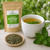 Certified organic Bulk Premium Peppermint Leaf Tea by The Tea Hut, shown with brewed peppermint tea and certified organic premium peppermint leaves.