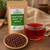 The Tea Hut Bulk Hawthorn Berry Tea (Whole) – certified organic whole hawthorn berries with kraft pouch and brewed tea.