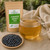 Certified organic Bulk Juniper Berry Tea by The Tea Hut, shown with brewed herbal tea and whole certified organic juniper berries.